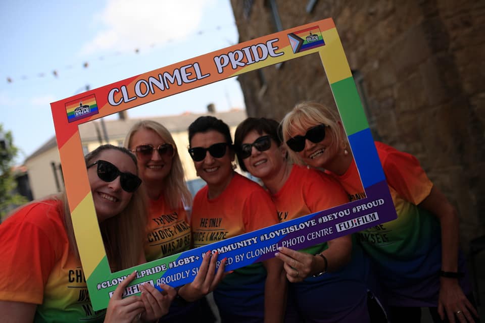 Pride attendees posing for a picture